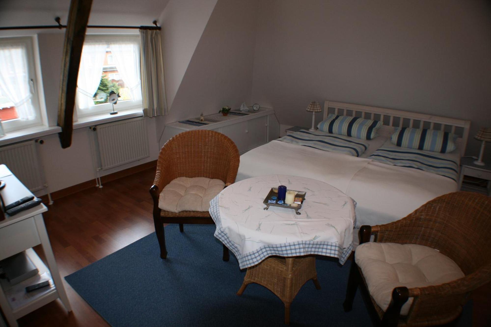 Ferienwohnungen Im Hotel Garni Zur Post Utersum Cameră foto