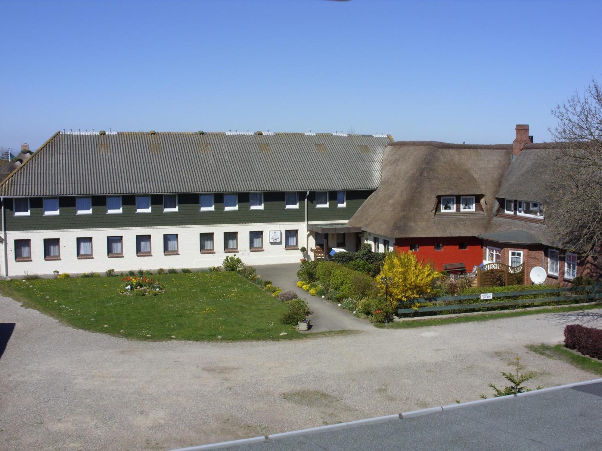 Ferienwohnungen Im Hotel Garni Zur Post Utersum Cameră foto